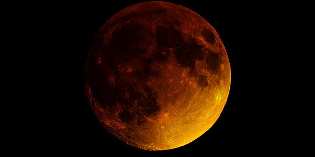 Sept. 27, 2015: A so-called 'supermoon eclipse' occurs New York City (Brian Tully)
