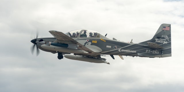 A Embraer EMB 314 Super Tucano A-29 experimental aircraft flies over White Sands Missile Range. (U.S. Air Force Photo by Ethan D. Wagner)