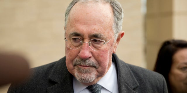 FILE - In this Dec. 21, 2015, file photo, Pennsylvania Supreme Court Justice Michael Eakin arrives at the Northampton County courthouse in Easton, Pa. for a hearing about whether he should be suspended while a judicial ethics court decides if his email practices warrant discipline. (AP Photo/Matt Rourke, File)