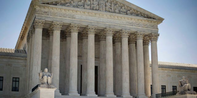 FILE - In this June 30, 2014 file photo, the Supreme Court building in Washington. The Supreme Courtâs lineup of cases is fit for an election year. Affirmative action, abortion and another look at the Obama health care law and its contraceptive mandate all are before the court, and they could well be joined by immigration, giving the court a run of cases that reads like a campaign platform. (AP Photo/Pablo Martinez Monsivais, File)