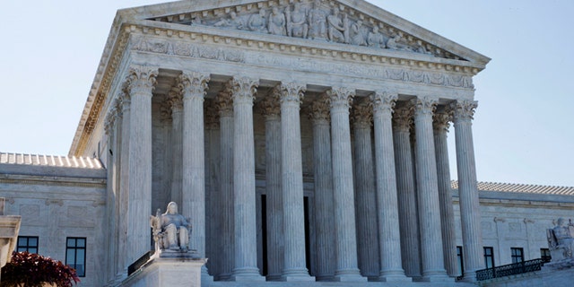 A view of the Supreme Court building in Washington, D.C. — which is now bordered by tall fencing, given the possibility of threats to the court after the leaked Roe v. Wade draft opinion. 