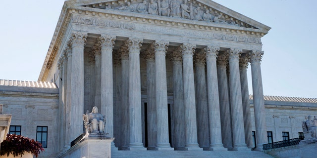 A view of the Supreme Court building in Washington, D.C. — which is now bordered by tall fencing, given the possibility of threats to the court after the leaked Roe v. Wade draft opinion. 