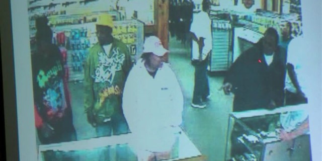 Surveillance video from inside the gun shop shows the sale, which Dunphy says was a "straw purchase." (Fox 6)