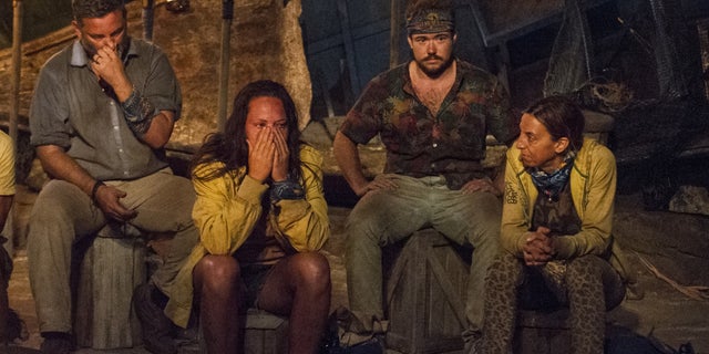 From l-r: Jeff Varner, Sarah Lacina, Zeke Smith and Debbie Wanner at Tribal Council on CBS' "Survivor."