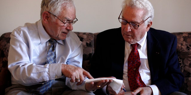 Feb. 23: Dachau survivor Ernie Gross, left, and Dachau liberator Don Greenbaum speak amongst themselves during an interview with the Associated Press in Philadelphia.
