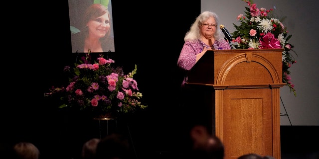 Car attack victim Heather Heyer's mother Susan Bro receives a standing ovation during her remarks at a memorial service for her daughter at the Paramount Theater in Charlottesville, Virginia, U.S. August 16, 2017. REUTERS/Jonathan Ernst TPX IMAGES OF THE DAY - RTS1C3TI