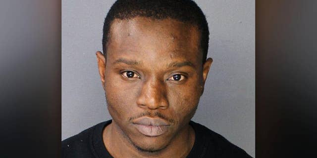 Suspect Ainsley Johnson, 34, allegedly bit off and swallowed a police officer's fingertip during a scufflle.