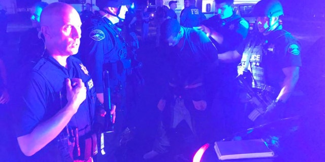 Police in Parkland, Washington have arrested a heavily armed suspect involved in a hostage situation late Thursday evening.