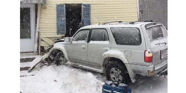 SUV crashed into house during snowstorm.