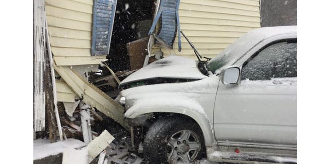 SUV driver suffered a broken leg in crash.