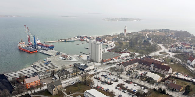 FILE _ This is a March 31, 2010 file photo of Slite harbor at the strategic island Gotland in Sweden. Officials on Sweden's militarily strategic Baltic Sea island of Gotland are mulling renting harbor space to a Russian company, even as the government warns that would be against the country's defense and political interests. (Soren Andersson/ TT, File via AP)