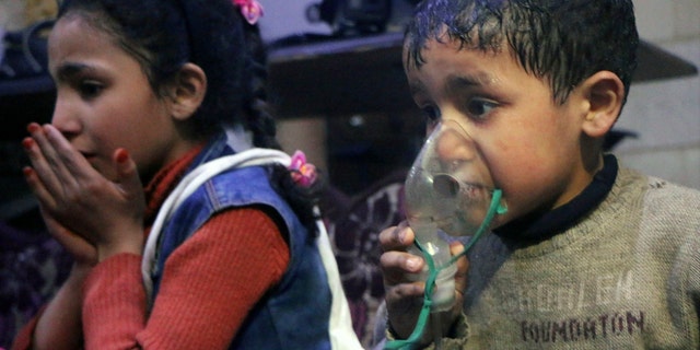Children are seen in Douma, Syria, following last week's chemical weapons attack.