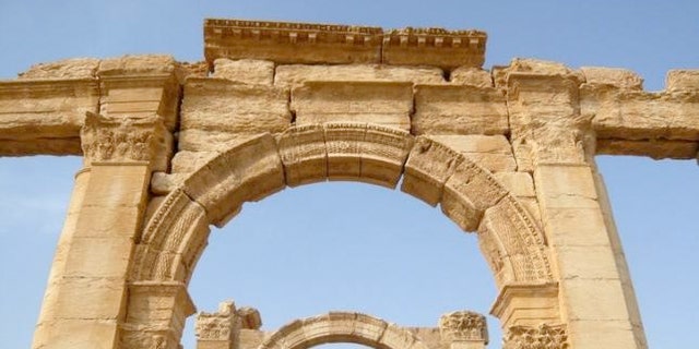 FILE: A view shows the Monumental Arch in the historical city of Palmyra, Syria, August 5, 2010.  In Oct., ISIS blew up the monument, which is in the 2,000-year-old city of Palmyra.