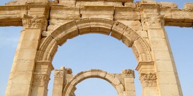 FILE: A view shows the Monumental Arch in the historical city of Palmyra, Syria, August 5, 2010. In Oct., ISIS blew up the monument, which is in the 2,000-year-old city of Palmyra.
