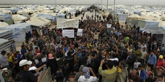 An estimated 500,000 Syrian refugees have fled to camps in Turkey. (AFP)