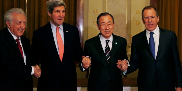 From left: UN-Arab League Envoy to Syria Lakhdar Brahimi, United Jan. 21, 2014: States Secretary of State John Kerry, UN Secretary-General Ban Ki-moon and Russia's Foreign Minister Sergey Lavrov join hands after their international conference on ending the crisis in Syria in Montreux, Switzerland.