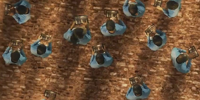 TabCo's new ad depicts current tablet buyers as lemmings falling off a cliff.