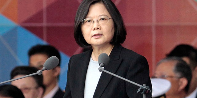 FILE - In this Oct. 10, 2016, file photo, Taiwan's President Tsai Ing-wen delivers a speech during National Day celebrations in front of the Presidential Building in Taipei, Taiwan.