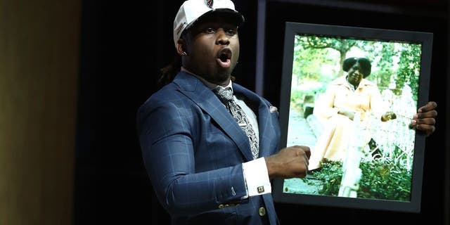 PHILADELPHIA, PA - APRIL 27: Takkarist McKinley of UCLA reacts after being picked #26 overall by the Atlanta Falcons during the first round of the 2017 NFL Draft at the Philadelphia Museum of Art on April 27, 2017 in Philadelphia, Pennsylvania. (Photo by Elsa/Getty Images)