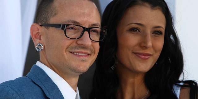 Chester Bennington of Linkin Park and wife Talinda arrive at the 2012 Billboard Music Awards in Las Vegas, Nevada, May 20, 2012.