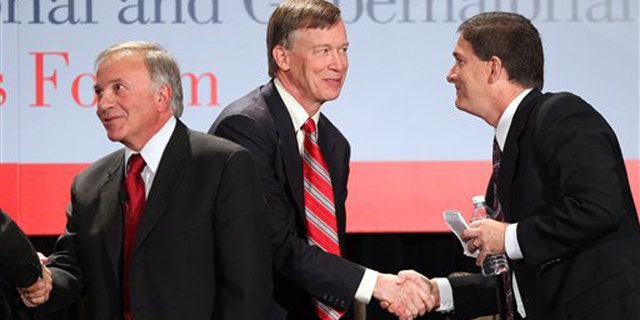 Colorado gubernatorial candidates Tom Tancredo, left, American Constitution Party, Democrat John Hickenlooper, center, and Republican Dan Maes exchange hand shakes after a forum in Denver on Oct. 15. (AP Photo)
