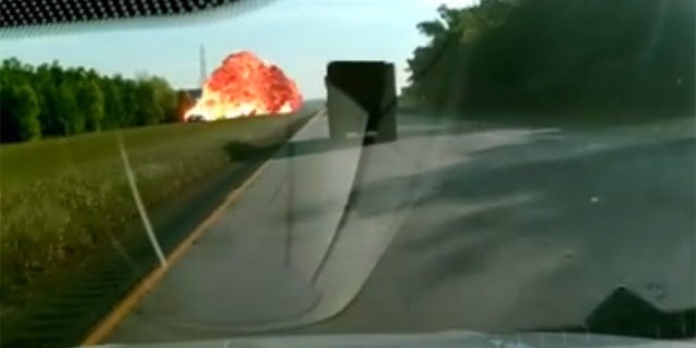 Screengrab of a dashcam video showing an intense crash and explosion in Louisiana.