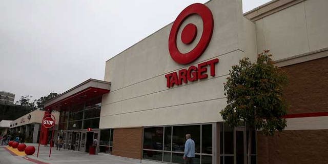 COLMA, CA - JUNE 15: A customer enters a Target store on June 15, 2015 in Colma, California. CVS Health announced that it has agreed to acquire Target's pharmacy and clinic businesses for an estimated $1.9 billion. (Photo by Justin Sullivan/Getty Images)