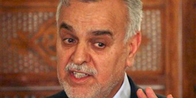 In this Wednesday, Sept. 26, 2007, file photo, Iraq's vice President Tariq al-Hashemi speaks to reporters during a news conference in Baghdad, Iraq. Iraq's Shiite-led government has issued an arrest warrant Monday Dec. 19, 2011, for Vice President Tariq al-Hashemi, the country's highest ranking Sunni official, on alleged terrorism charges.