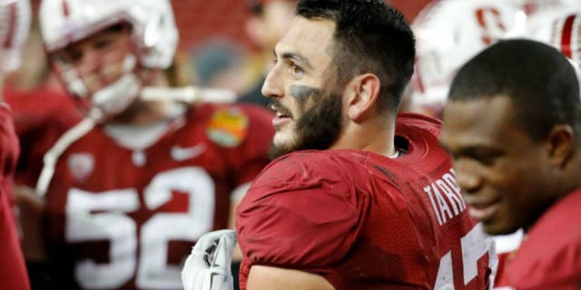 SAN FRANCISCO, CA - DECEMBER 30: A.J. Tarpley #17 of the Stanford Cardinal eyes the scoreboard during the inaugural Foster Farms Bowl against the Maryland Terrapins at Levi's Stadium on December 30, 2014 in San Francisco, California. (Photo by Tom Dahlin/Getty Images)