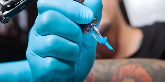 He had gotten a crucifix and pair of praying hands tattooed on his calf five days prior to swimming, and began suffering from fever, chills and a rash close to the ink after taking a dip.