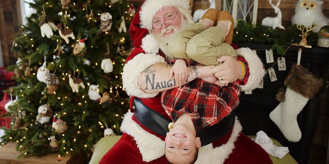 Scott Diethorne, a mall Santa in Pennsylvania, is only allowed to take "traditional" photos this year.