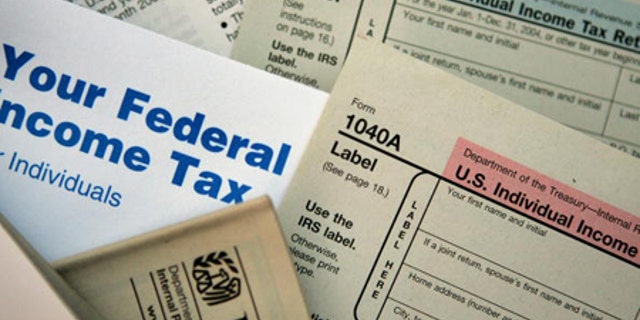 Federal tax forms are distributed at the offices of the Internal Revenue Service in Chicago.