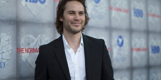 Taylor Kitsch plays cult leader David Koresh in the mini-tv series "Waco."