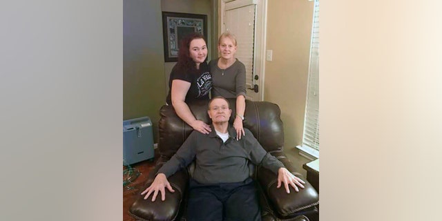 This photo provided by Eric Sanders shows Texas shooting victim Cynthia Tisdale, top right, with her husband, Recicie Tisdale, center and niece Olinde, left.