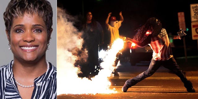 Texas English teacher Vinita Hegwood is out of a job after tweeting that those who disagreed with her about the racially-charged shooting in Ferguson, Mo., which sparked looting and riots, could kill themselves. (Duncanville Independent School District, AP)