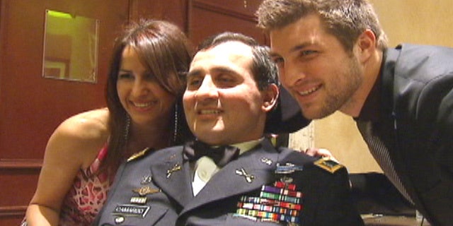 Mar. 9, 2012: U.S. Army Ranger Romy Camargo got a surprise visit from Tim Tebow in Florida.