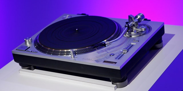 The Technics 50th anniversary limited edition Grand Class SL-1200GAE turntable is on display during a Panasonic news conference at CES Press Day at CES International, Tuesday, Jan. 5, 2016, in Las Vegas. (AP Photo/John Locher)