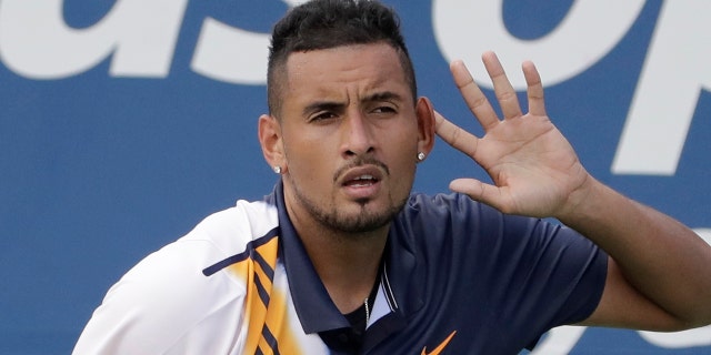 Nick Kyrgios, of Australia, reacts against Pierre-Hugues Herbert, of France, during the second round of the U.S. Open tennis tournament.