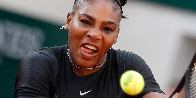 Serena Williams of the U.S. returns a shot against Germany's Julia Georges during their third round match of the French Open tennis tournament at the Roland Garros stadium in Paris.