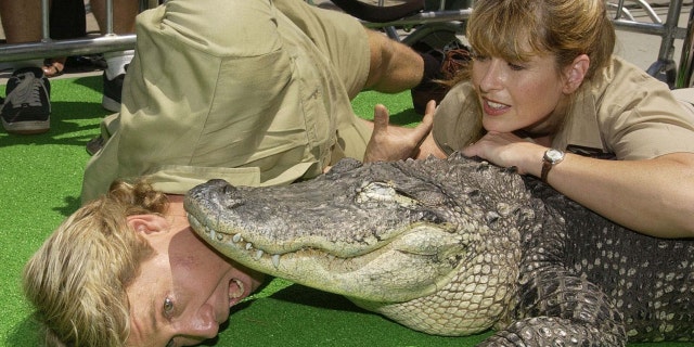 Steve and Terri Irwin pose with a crocodile in 2002.