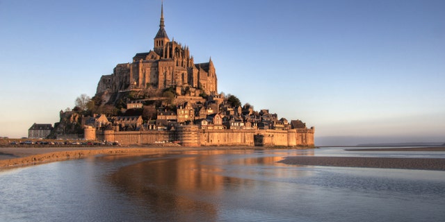Mont Saint Michel bay taken at dawn. Normandy , France .