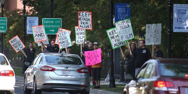 Sept. 10, 2014: Protesters march in front of the Capitol in Carson City, Nev. (AP)