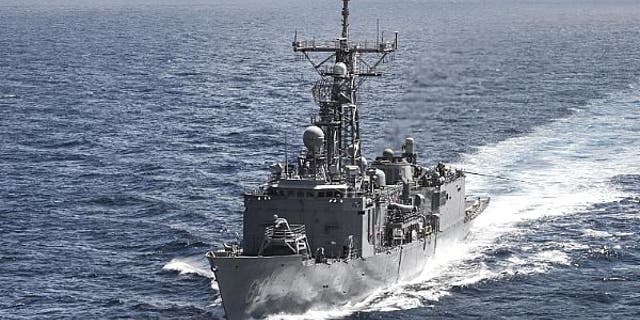 141004-N-TW634-734
INDIAN OCEAN (Oct. 4, 2014) The Oliver Hazard Perry-class guided-missile frigate USS Rodney M. Davis (FFG 60) departs from a replenishment-at-sea with the Military Sealift Command fleet replenishment oiler USNS Tippecanoe (T-AO 199). Rodney M. Davis is on patrol in the Indian Ocean in support of regional security and stability. (U.S. Navy photo by Mass Communication Specialist 3rd Class Derek A. Harkins/Released)