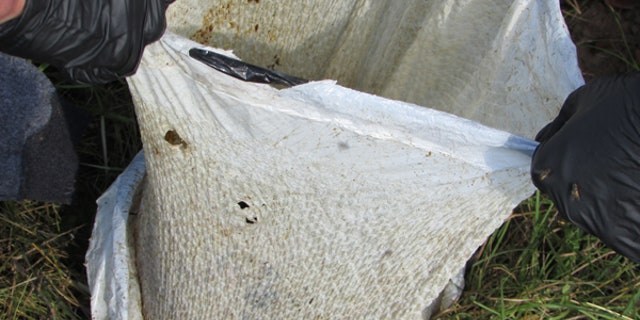 The remains were wrapped inside two white plastic bags.