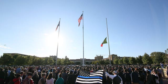 Supporters of Officer Floyd East Jr. at a memorial service Tuesday.
