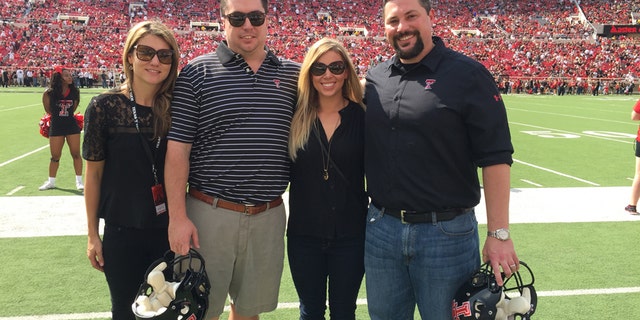 Tracy Sellers, John Sellers, Tara Campbell, and Cody Campbell at a Texas Tech football game