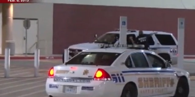 Footage from Feb. 5, 2013 shows the response by police after a girl was brutally raped near a movie theater outside of Houston.