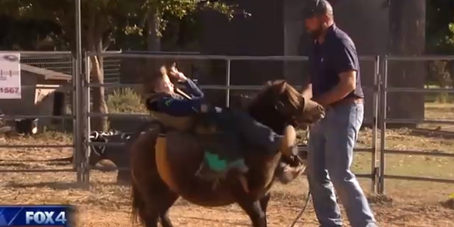 Texas boy Lealond Henderson, 9, is one of the lightest riders in his division.