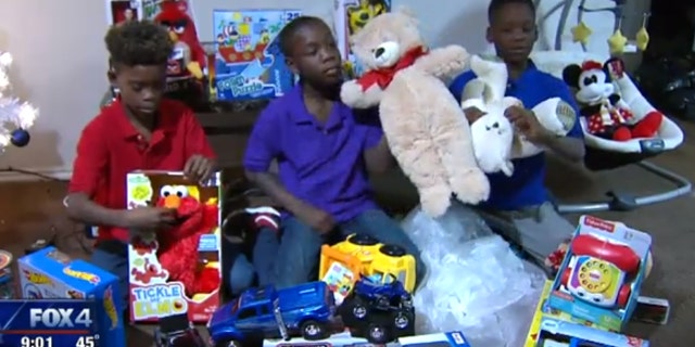 Brittney Curry's three sons were given new Christmas gifts from Fort Worth Police Officers after theirs were stolen from her truck.