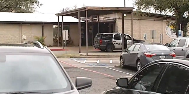A school in Houston was placed on lockdown after a student brought a gun to the building in his hoodie, police said.
